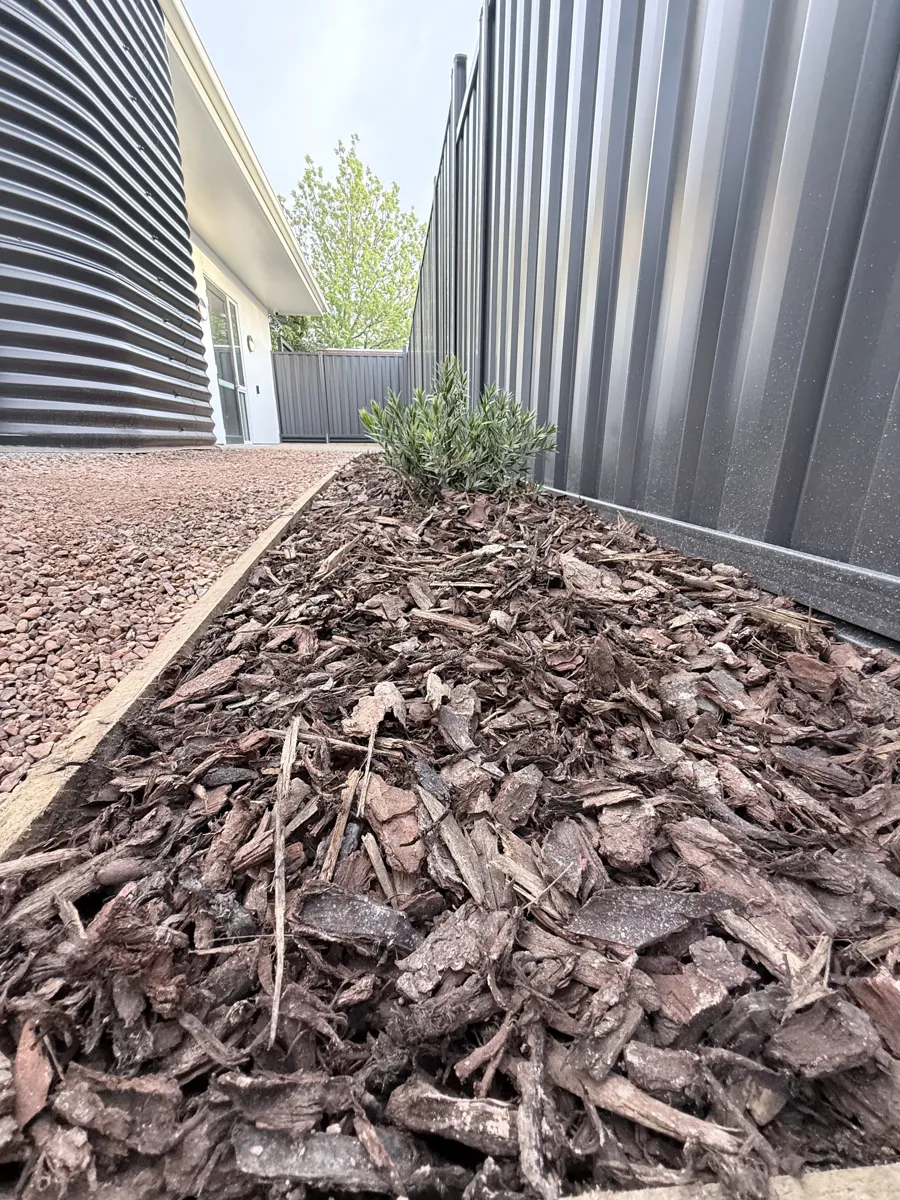 Aluminium blade fencing and planted bed