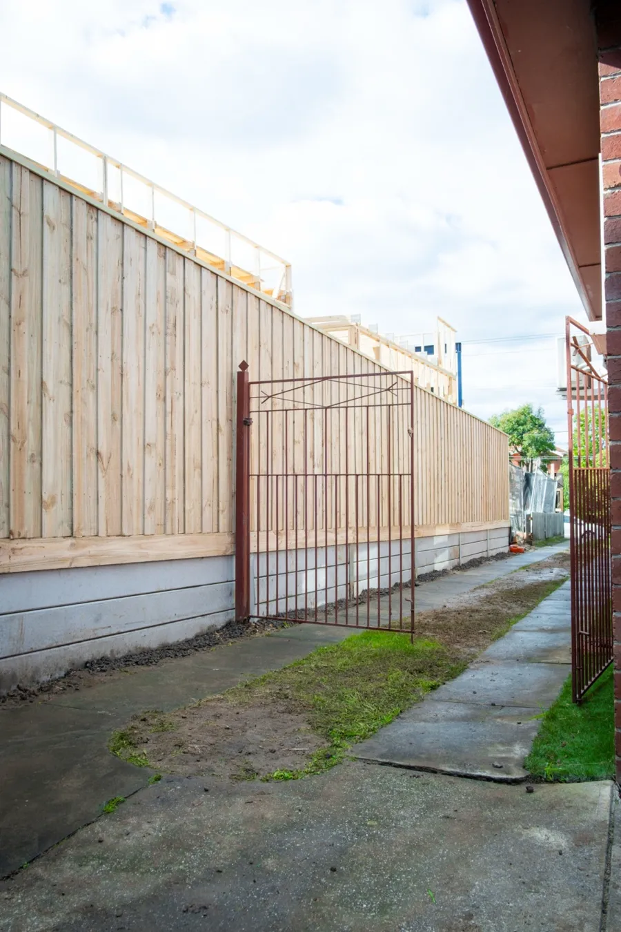 Timber paling fence and gate