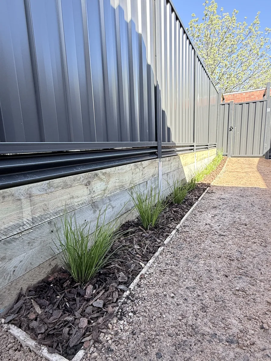 Concrete sleeper wall under Colorbond